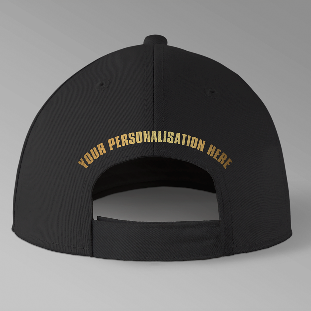 Rear view of a black baseball cap showing gold 'YOUR PERSONALISATION HERE' lettering above the adjustable strap.