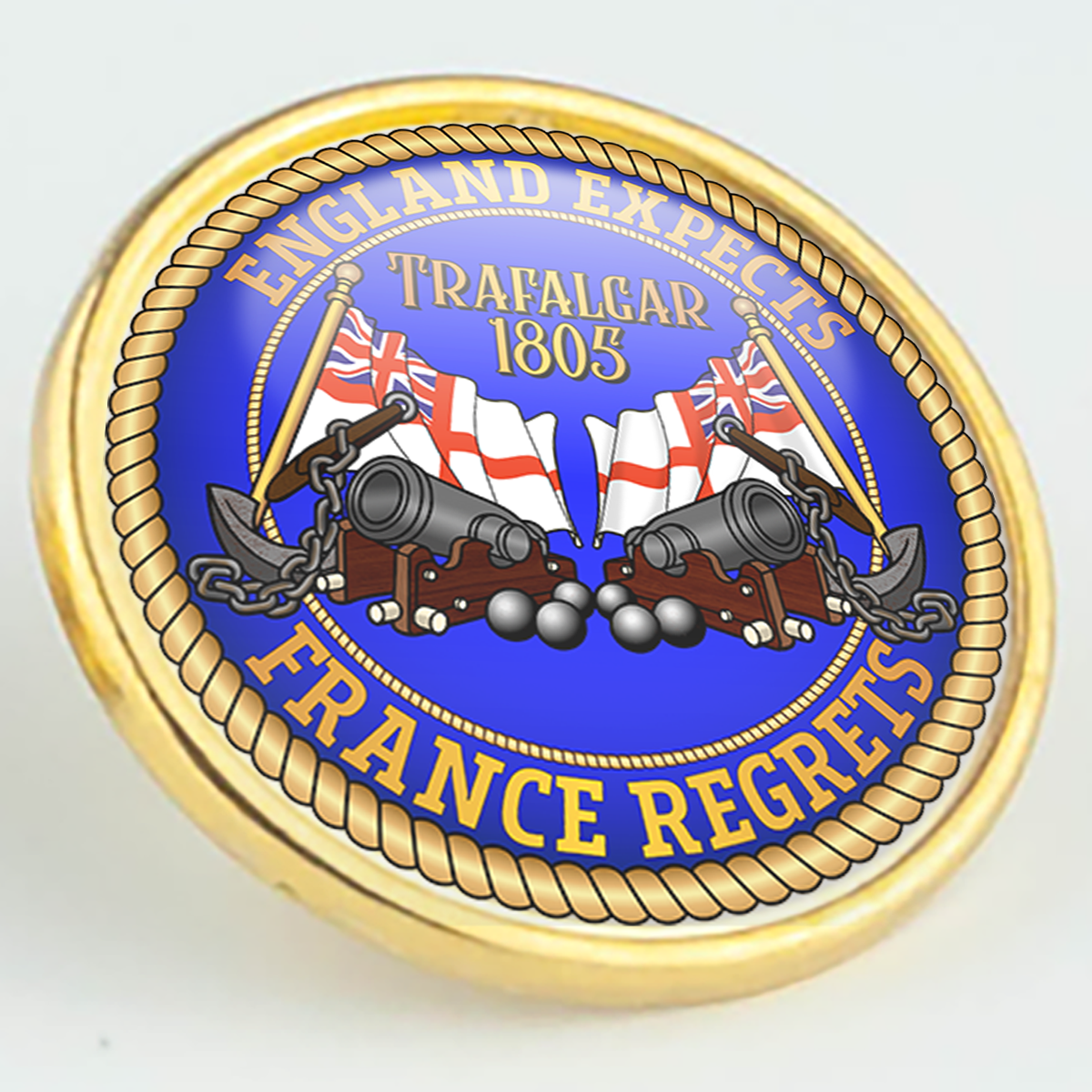 Trafalgar 1805 'England Expects. France Regrets.' Pin/Lapel Badge with White Ensigns, cannons, cannonballs and anchors on blue with a gold-coloured rope border